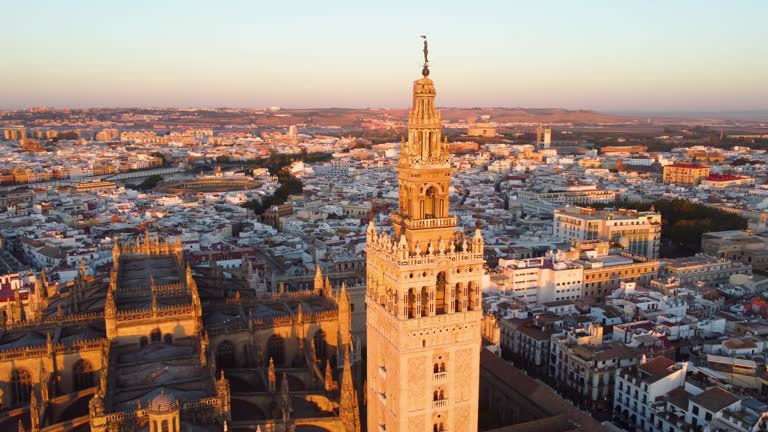 Catedral de Sevilla. Drone shot of the beautiful Spanish city of Seville at the sunrise.